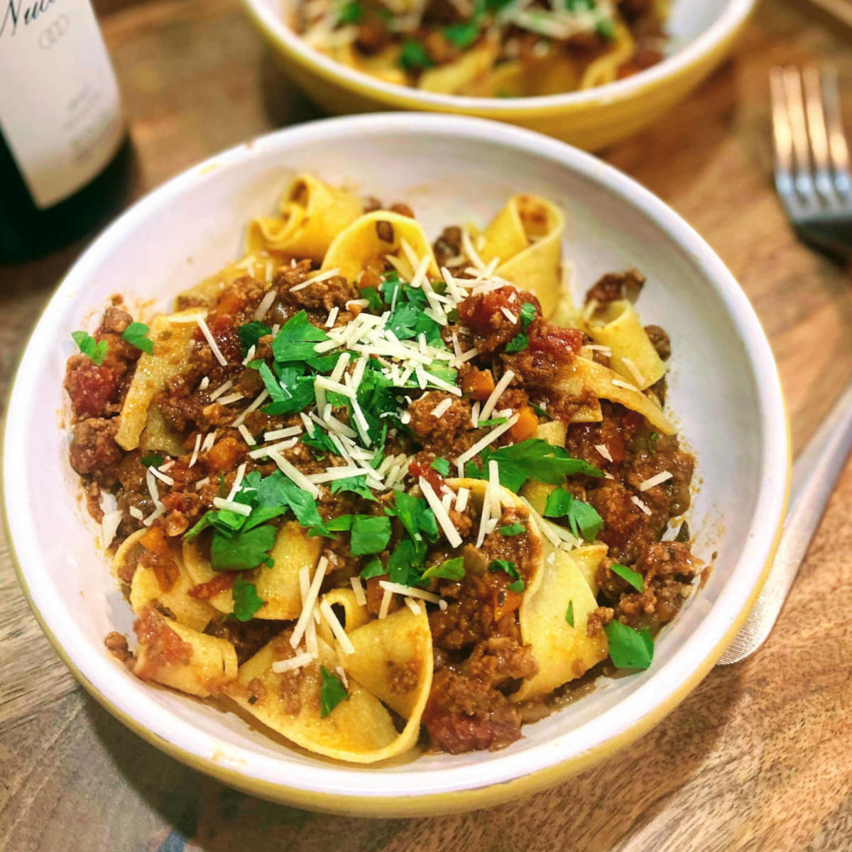 bowl of pasta topped with meaty bolognese